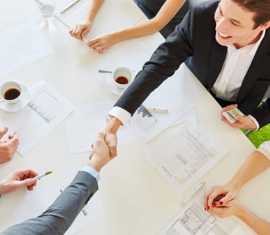 Business people handshake as sign of partnership