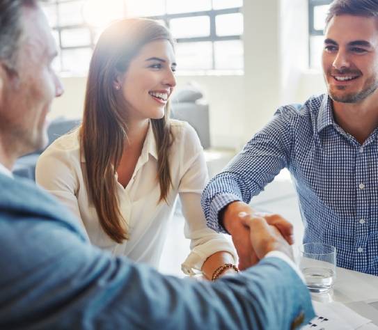 Business, people and meeting with handshake in office for real estate